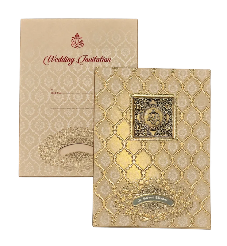 Gold patterned wedding invitation and matching envelope